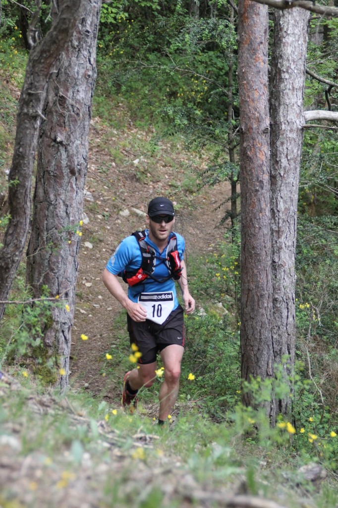 Descending through the forest down to the finish line